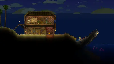A two-story wooden NPC house on the ocean shoreline at night