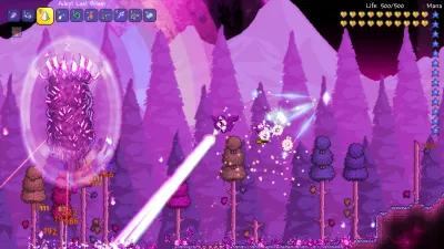 A player fighting the Nebula Pillar with a beam weapon